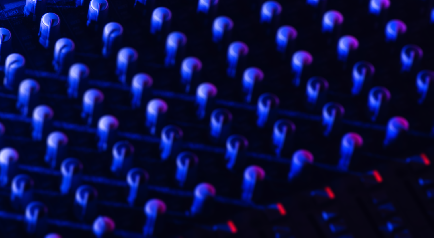 audio-mixing-board-knobs-in-blue-and-purple-2026-10-05-20-07-38-22